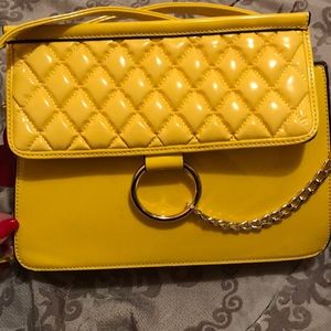 New yellow woman’s handbag